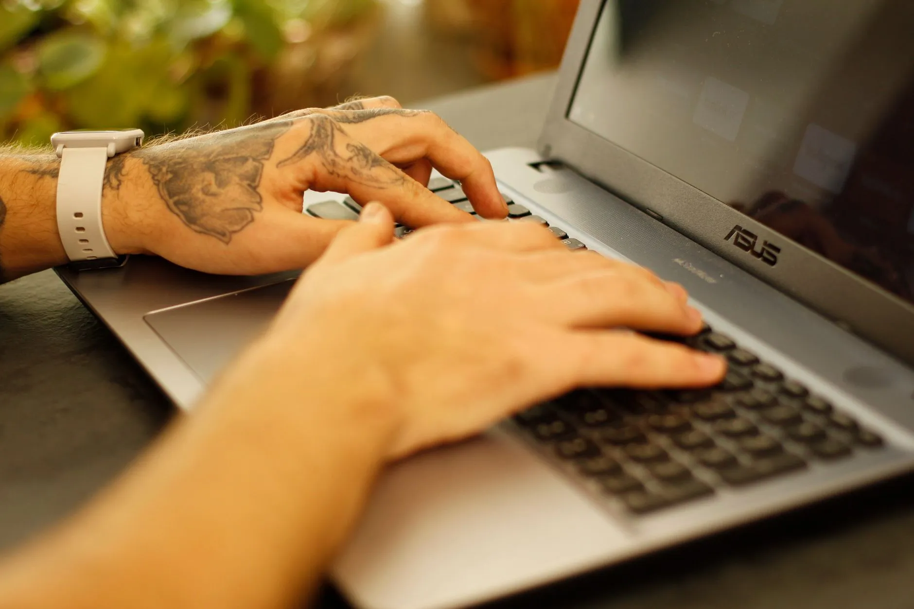 A copywriter editing an AI draft on a laptop